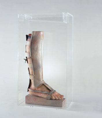 Paul Thek. 1966-1967. "Warriors Leg." Lucite box, wood, wax, leather,
			metal and paint.